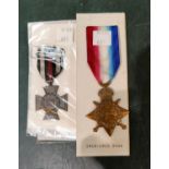 A WWI star awarded to PTE, T. G. Chapman and a WWI German cross