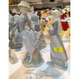 2 Lladro groups - girl with parasol; girl with hen 28 & 24cm