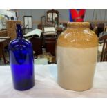 A 19th century Bristol Blue bottle from The Duckworth Group flavourings & a large stoneware jar "