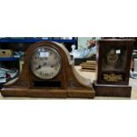 A 1930's striking mantel clock in oak Napoleon hat shaped case; 2 other clocks