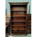 A reproduction mahogany full height bookcase