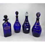 A Georgian near matching set of 3 decanters in Bristol blue, lettered in gilt, 2 x Rum, 1 x