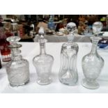 A mallet shaped cut decanter with silver rim; an hourglass decanter; 2 Victorian etched decanters