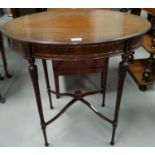 An early 20th century mahogany occasional table, Adam style with oval top, on tapering reeded legs