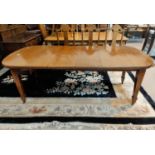 An Edwardian inlaid mahogany 'D' end wind out dining table with 2 spare leaves,