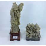 A pair of modern carved soapstone carvings: female deity, and flowers and bird