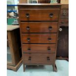 A 1950's 5 drawer chest in oak finish