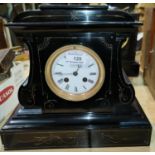 A 19th century mantel clock with French striking movement in black and variegated marble