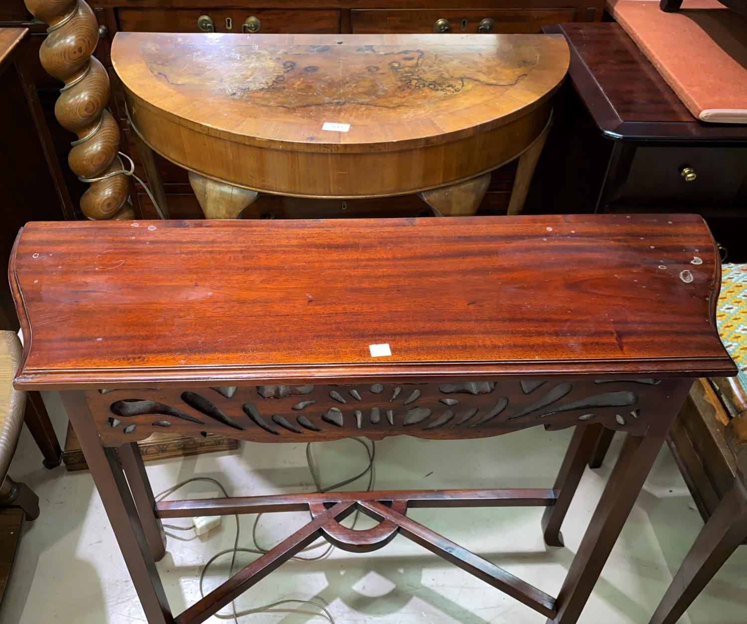 A crossbanded walnut demi-lune side table; a reproduction mahogany side table