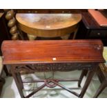A crossbanded walnut demi-lune side table; a reproduction mahogany side table