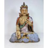 A Chinese ceramic figure of a seated buddha in Lots position, height 30cm
