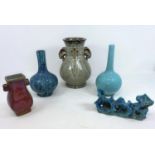 A Chinese ceramic lobed and mottled blue vases with marks to base, a similar abstract item, seal