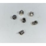 A selection of 7 silver Pandora charms