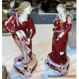 A pair of Continental porcelain figures of a beau and his lass, 33cm