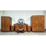 A 1930's Art Deco burr walnut 7 piece bedroom suite