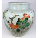 A large Chinese famille vert vase decorated with birds, butterflies and insects etc, of rounded form