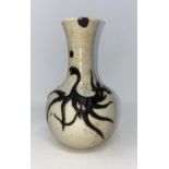 A Japanese crackle glaze vase with dripware decoration