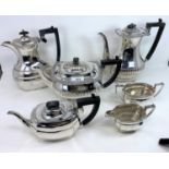 A silver plated 4 piece tea service; a 2 piece service; a gallery tray; 2 silver handled button