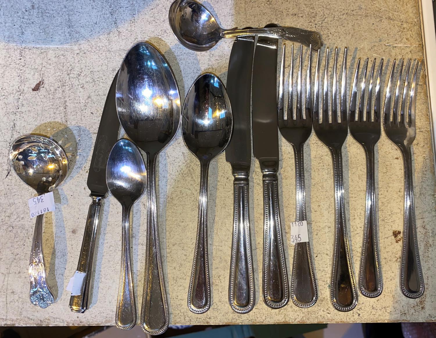 A selection of cutlery and silver plate