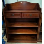 A reproduction mahogany 3 height bookcase