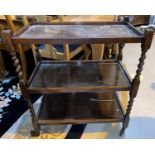 An oak 3 tier trolley with barley twist supports, 70 cm