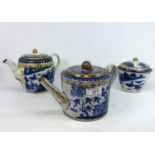 Two blue and white Chinese export tea pots and similar lidded bowl decorated with gilt highlights (1
