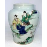 A Chinese porcelain inverted baluster famille vert vase decorated with traditional figures, height