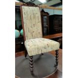 A 19th century rosewood high back chair with later tapestry pattern upholstery