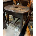 A 19th century occasional table/stool with oval top; and another