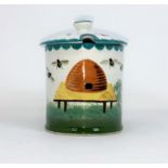 A Wemyss honey pot decorated with bees and hive, height 13cm