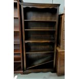 A reproduction mahogany full height bookcase