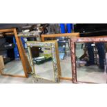 Three wall mirrors in rectangular floral frames; 2 large mirrors in pine effect frames