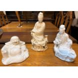 Two Chinese porcelain blanc de chine figures of seated characters (one restored) and another of a