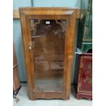 A 1930's walnut small display cabinet