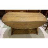 A modern Ercol drop leaf coffee table