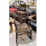 A Windsor style rocking armchair