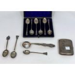 A set of 6 hallmarked silver teaspoons, boxed, Birmingham 1899; a hallmarked silver cigarette
