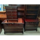 A reproduction pair of dwarf chests of drawers in mahogany; a similar cabinet