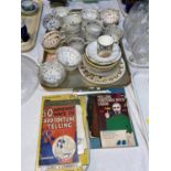 A collection of fortune telling cups and saucers