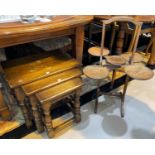 A nest of 3 oak occasional tables; an oak folding cake stand