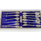 A cased set of 6 continental silver stamped 830S cake forks and cake spoons (220g gross)