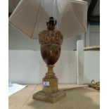 A classical vase shaped table lamp in brown onyx