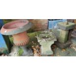 A Victorian terracotta urn; a stone birdbath