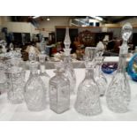 Eight various cut glass decanters (1 with chip to rim)