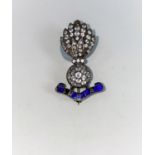 A Royal Fusiliers India brooch, set white cut stones, in blue enamel mount