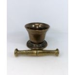 A 19th century heavy brass pestle & mortar;