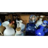 A selection of branded pottery decanters; etc.