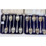 Twelve hallmarked silver golfing teaspoons, cased, various dates