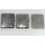 2 chased and monogrammed hallmarked silver cigarette cases Chester 1908 & Birmingham 1911 (one