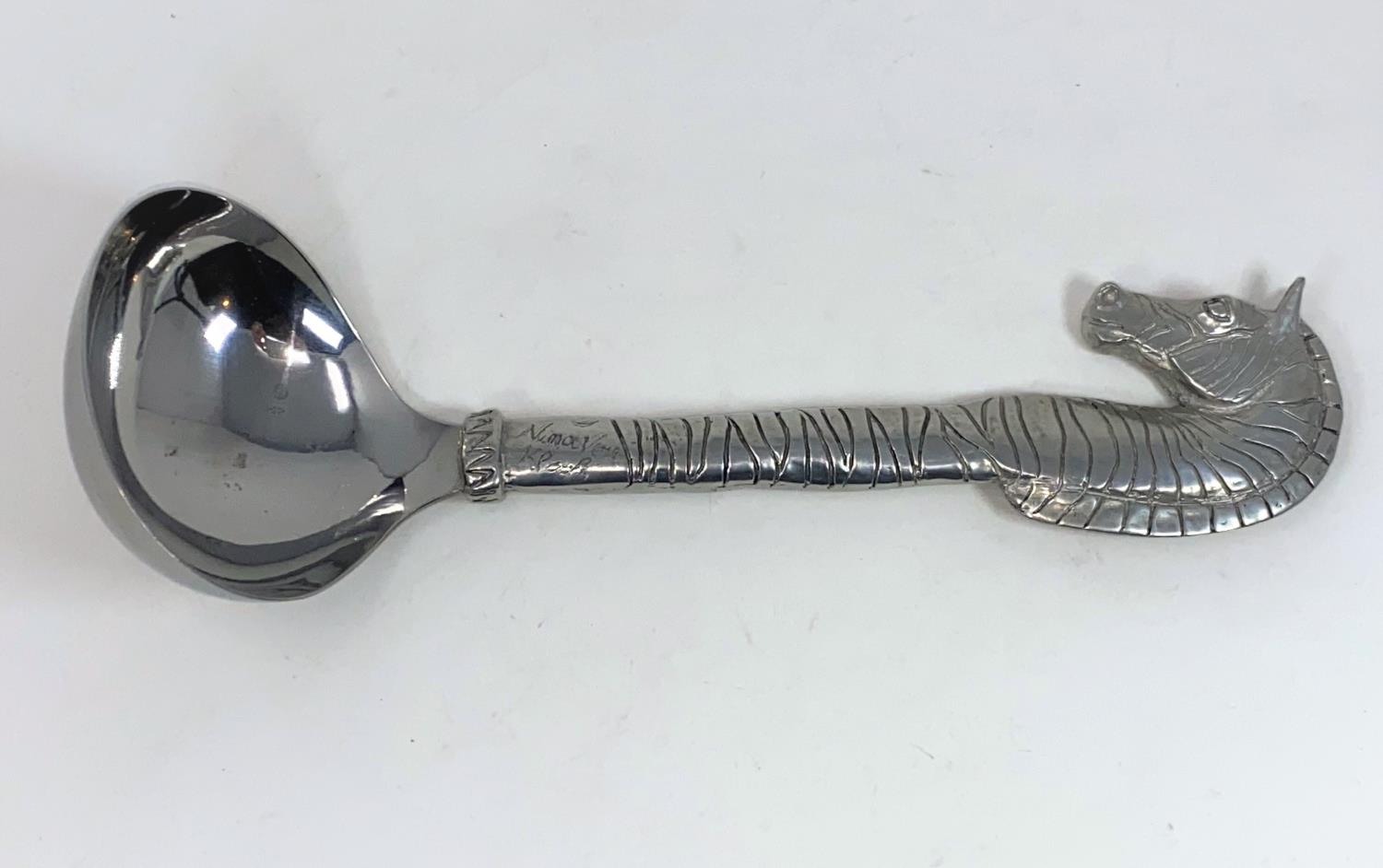 A Scandinavian large ladle with zebra shaped finial, signed 'Nimn van Kpop'